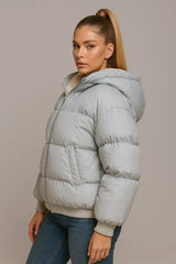 Side view of white lamb fleece puffer jacket with hood for women winter fashion