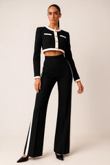 Black and white tailored suit with cropped blazer and wide-leg pants – elegant women’s fashion set